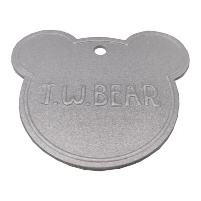 China Dinky Bear Embossed Clothing Labels Double TPU Silver Color Reflective Garment Labels Te koop