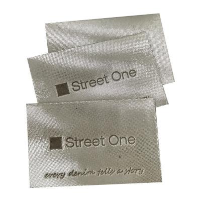 China Custom Leather Clothing Labels Garment Rectangle Silver Color Label for sale
