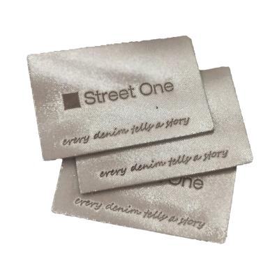 中国 Silver Color Leather Clothing Tags Private Patch For Heavy Duty Garment 販売のため