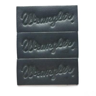 China Black Square Leather Label Tags Customized High End Embroidered PU à venda
