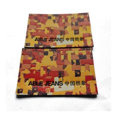 China Garment Accessories Leather Clothing Labels Printed Embossed Private T Shirt Label à venda