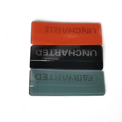 China Multiple Colors Rubber Clothing Label Nickel Free Patch Custom Size à venda
