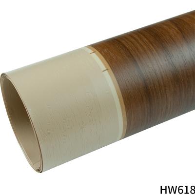 China Revestimiento laminado de chapa de PVC de vinyl de grano de madera para muebles de mesa en venta