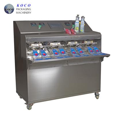 China Máquina de llenado de bolsas preformadas KOCO / Puede proporcionar materiales de embalaje personalizados en venta