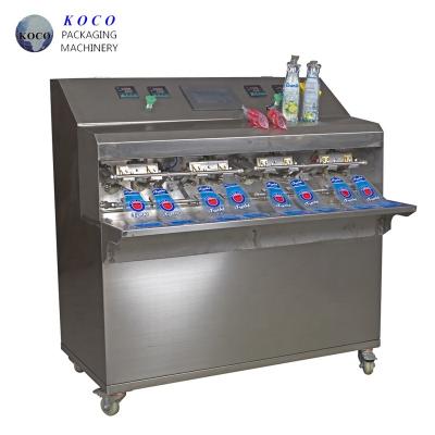 China Easy to Operate Semi Automatic Filling And Sealing Machine for Liquid Packaging for sale