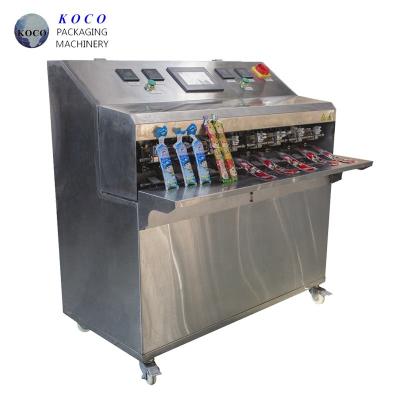 China KOCO Filling Sealing Machine Water Juice , Milk and Other Kind Liquid Liquid Packaging Flowing Liquid PLC+ Touch Screen for sale