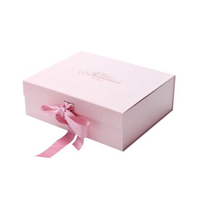 China Moisture Proof Embossing Magnetic Folding Gift Boxes Eco Packaging Box With Ribbon for sale