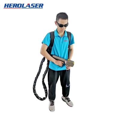 中国 Herolaserの携帯用バックパック移動式レーザーの錆除去剤クリーニング機械洗剤 販売のため
