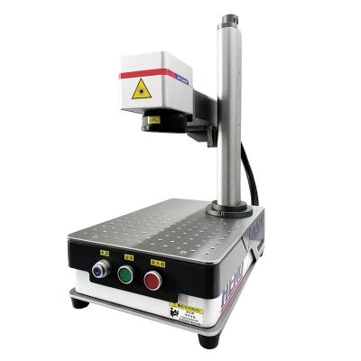 China la máquina de grabado de fibra óptica del laser de la mesa de 100w IPG para los recambios del metal etiqueta en venta
