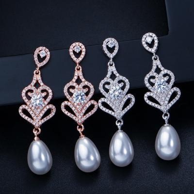 China Special Geometrical Silver Color Pearl Earrings Brinco High-Grade CZ Zircon Pearl Earring For Women for sale