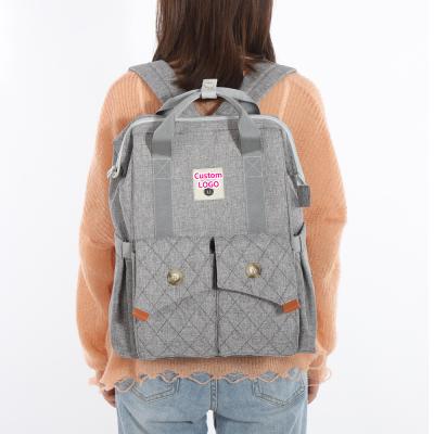 China Multifunctional Mommy Diaper Bag Backpack With Trailer Buckle OEM ODM for sale