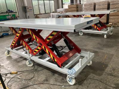 China Heavy Duty Electric Mobile Scissor Lift Table With Wheels 4000kg Wireless Remote Control for sale