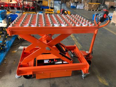 China Scissor Automatic Braking Mobile Lift Tables 500kg With Integrated Pop Up Ball Transfer for sale