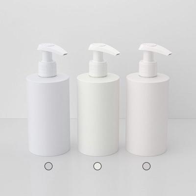 China Cylinder Makeup Pump Bottle Refillable Shampoo Bottles With Pump for sale