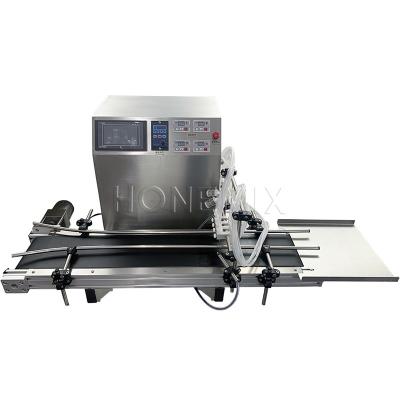 China Small 4 Head Liquid Filling Machines Electric With Conveyor Belt for sale