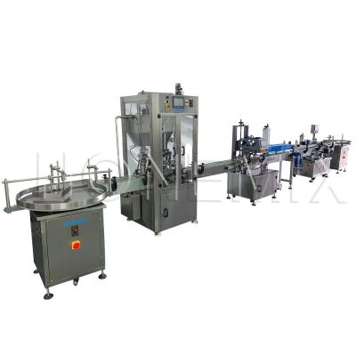 China Heated Vaseline Cream Filling Machine Two Nozzle Capping Sealing Labeling Line for sale