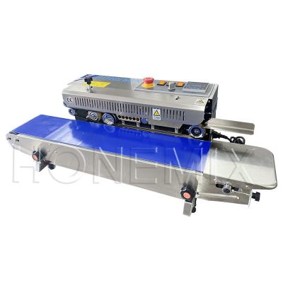 China Máquina de vedação de filme de plástico horizontal 600W aquecimento Elétrico selante de sacos de plástico à venda