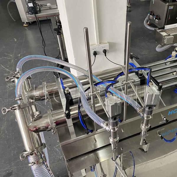 Quality Cosmetics Two Head Filling Machine Piston Horizontal Filling Machine CE for sale