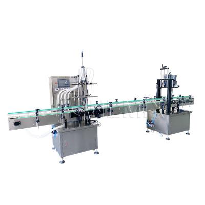 China Red Wine Juice Filling And Capping Machine 220V Automatic Liquid Filler for sale