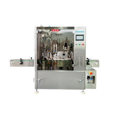 China Cosmetic Cream Filling Machine Automatic Rotary Bottle Filling Machine for sale