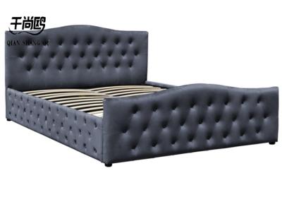 China Button-tufted velvet fabric curve headboard cushioned gas lift platform storage bed for sale