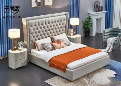 China Handmade Pleated Upholstered Bed Frame Double Metal Rivet Custom Upholstered Platform Bed for sale