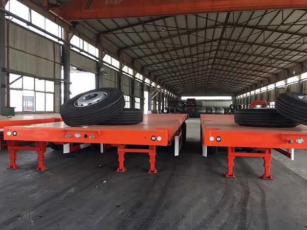 Quality 3 Axle Flatbed Semi Truck Trailer 30t 60t For Container Carrying for sale