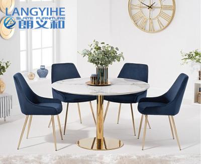 China Iso 9001 120cm Round Marble Effect Dining Table With Fern Velvet Chairs Blue for sale