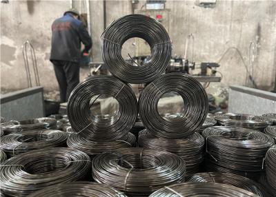 中国 18 Gague 1.2kgのコイル20ロールスロイス/プラスチック バレルの黒によってアニールされるRebarワイヤー 販売のため