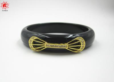 中国 独特な黒はカスタマイズ可能な樹脂の腕輪のブレスレットの宝石類の付属品を生み出します 販売のため