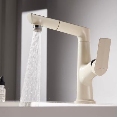 China Electroplated Pull Down Bathroom Sink Faucets Milk White Cold And Hot Face Wash for sale