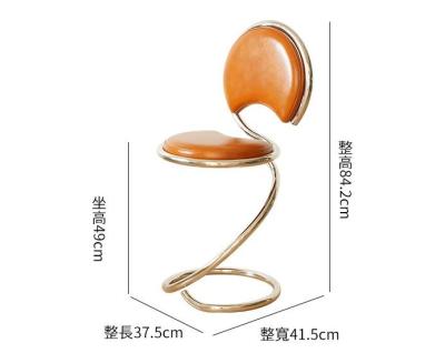 中国 北欧の最小主義の創造的な設計ステンレス鋼 フレームの革食事の椅子 販売のため