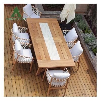 China Durable Simple Patio Furniture Garden Table And Chairs Teak Outdoor Dining Set à venda