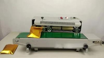 China Automatic Horizontal Band Sealer Machine 0.6Mpa Multipurpose for sale