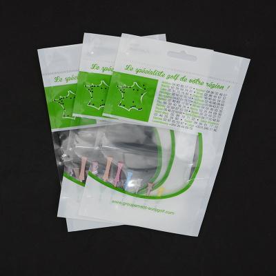 China Customized logo OPP plastic golf bag with wooden golf tee/ 3 side seal laminated plastic bag with hanger for sale