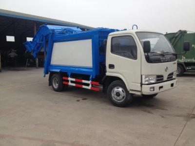 Chine Mini camion 3-4cbm d'ordures de conteneur de petit pain de bras de camion de chargeur de saut de camion à ordures de bras d'oscillation à vendre