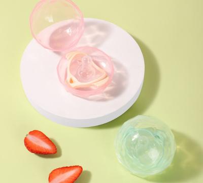 中国 FDAの通気性の穴が付いている液体のシリコーンの赤ん坊の調停者の柔らかいニップル 販売のため