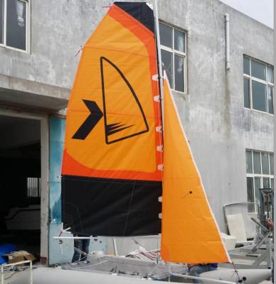 China Easy Take Inflatable Sailing Boat Orange Sailing Cat With Fiberglass Rudder for sale