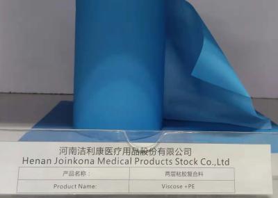 China 28 Gsm Medical Non Woven Fabric Absorbent Viscose 3 Gsm Glue 27 Gsm Blue PE Film for sale