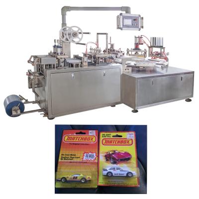 China Pneumatic Blister Automatic Packing Machine Gold Coin Packaging Machine for sale