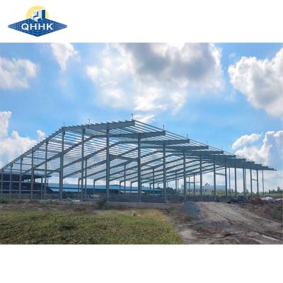 China Q235B/Q355B Carbon Steel Heavy Steel Portal Frame Structure Warehouses Almacen zu verkaufen