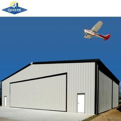 Chine Panneau sandwich Parquet toit q355B Entrepôt de cadre Hélicoptères Aéronefs en acier Hangar bâtiments à vendre