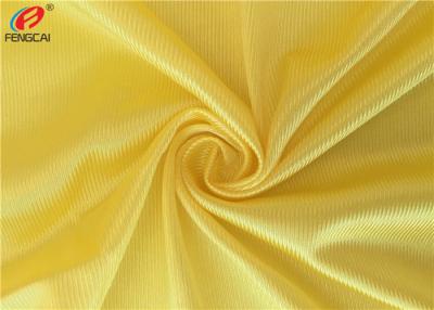 China 100 % Polyester Dazzle Fabric Sportswear Jersey Tricot Knit Fabric In Yellow Color for sale