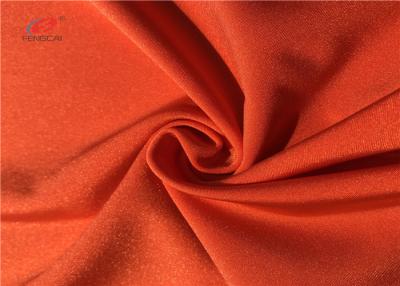 Chine Tissu orange semi mat de Spandex de polyester de couleur pour le yoga de guêtres de sous-vêtements de vêtements de bain à vendre