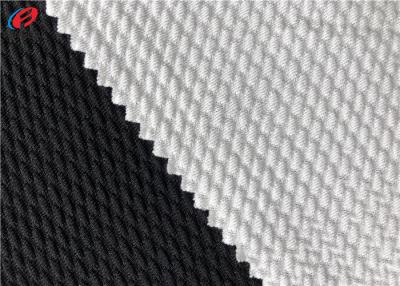 China Bullet Weft Knitted Jacquard Stretch Polyester Spandex Fabric for sale