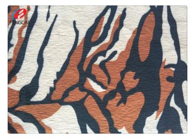 Chine Tricot 100% de polyester de polyester Tiger Skin Printed Design tricoté par tissu à vendre