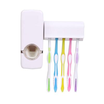 China Automatic Bathroom Wall Mounted Toothpaste Dispenser With Five Toothbrush Holder for sale