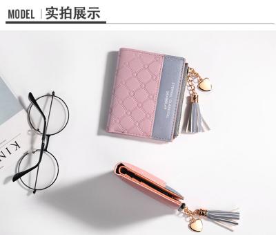 China La versión coreana de la nueva cartera corta de mujeres cartera corta de color de flexión cartera corta de franjas de cremallera de monedas de múltiples tarjetas cartera en stock en venta