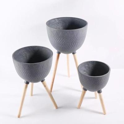China Eco Friendly Docarative Home plant pot with legs europe style clay flower pots modern for sale