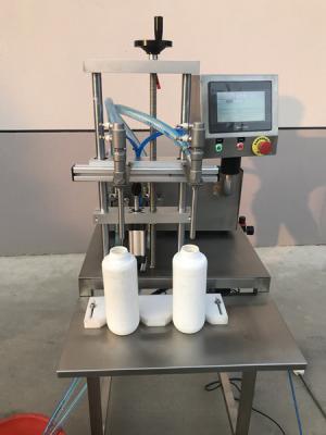 Chine SS316 100ml à la machine de remplissage de bouteilles de l'eau 5000ml, machine de remplissage de bouteilles de shampooing à vendre